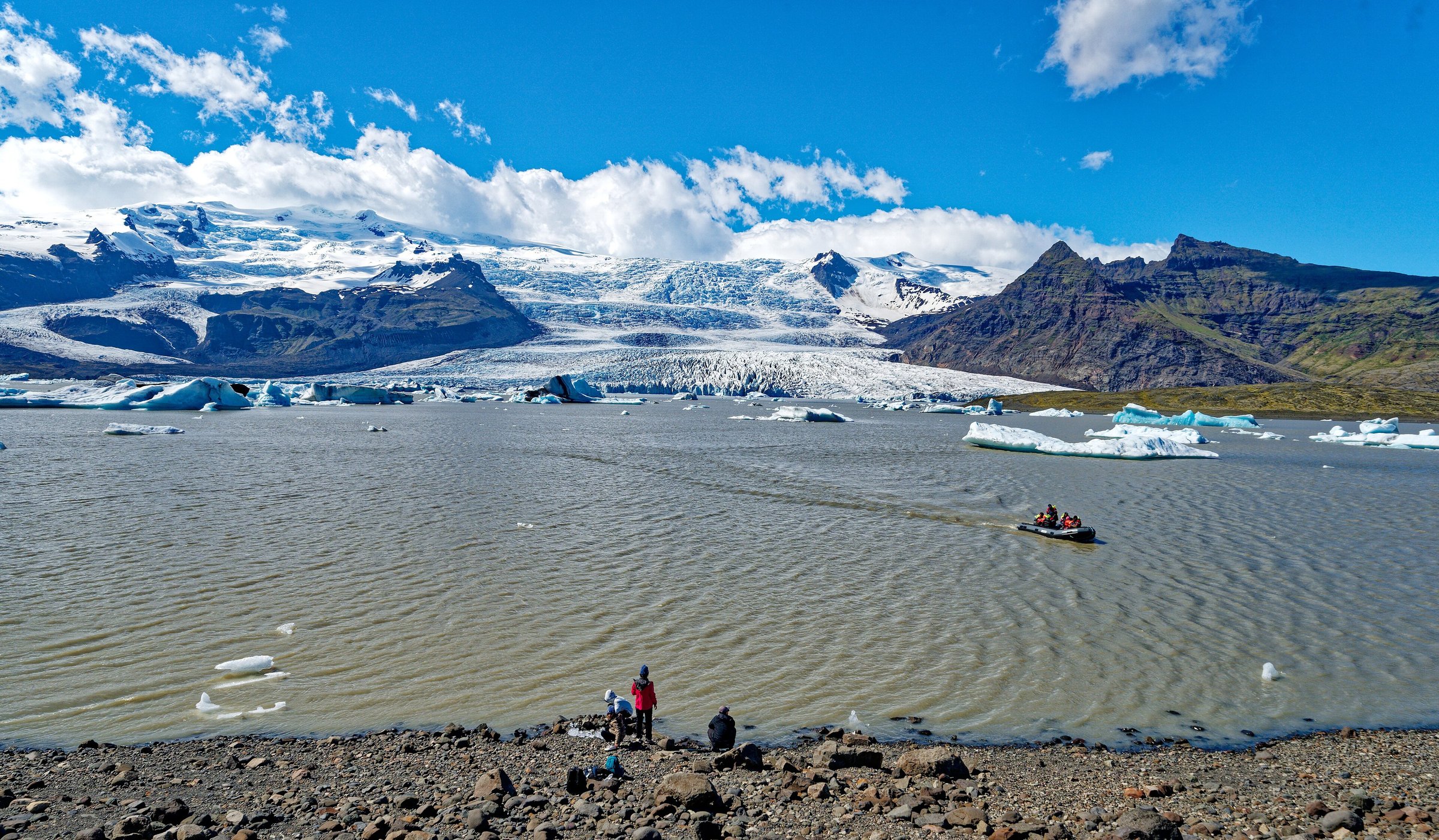 icebergs, small figure on shore